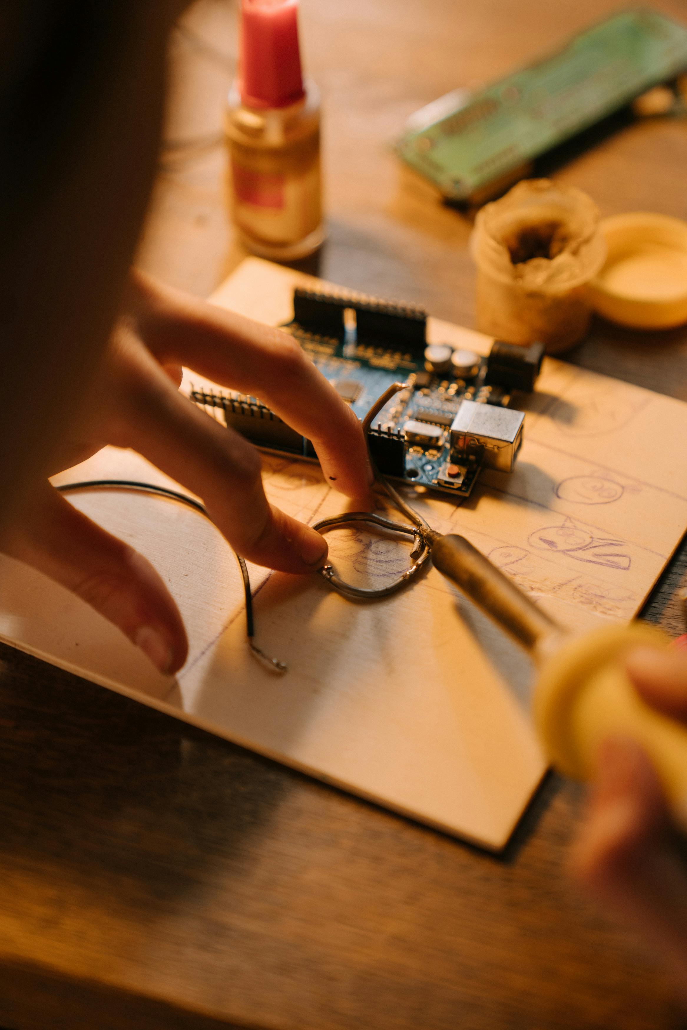 Why PCB ground and metal chassis with a resistive connection?